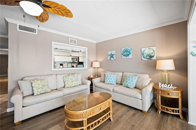 1051 Beach Blvd, Gulf Shores, AL 36542 - living room featuring crown molding, wood finished floors, and ceiling fan