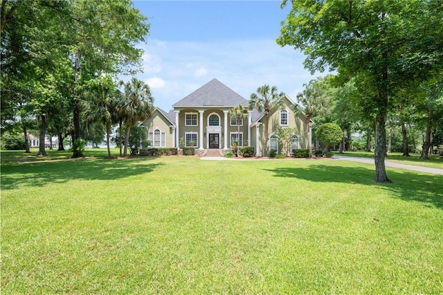 2924 Riverview Pointe Dr S, Theodore, AL 36582 - neoclassical home featuring a front lawn and stucco siding