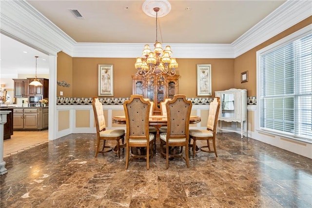 2924 Riverview Pointe Dr S, Theodore, AL 36582 - dining space featuring a chandelier, ornamental molding, and marble finish flooring