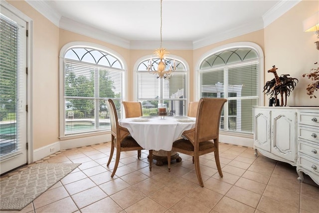 2924 Riverview Pointe Dr S, Theodore, AL 36582 - dining area featuring a chandelier, ornamental molding, light tile patterned flooring, and baseboards