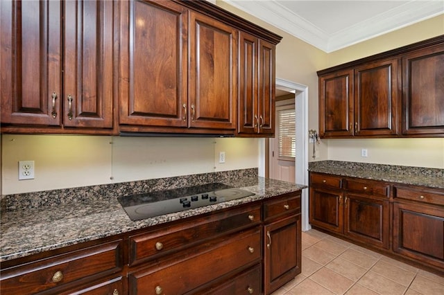 2924 Riverview Pointe Dr S, Theodore, AL 36582 - kitchen featuring dark stone countertops, light tile patterned floors, black electric cooktop, crown molding, and dark brown cabinetry