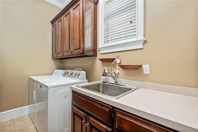 2924 Riverview Pointe Dr S, Theodore, AL 36582 - washroom featuring washing machine and clothes dryer, cabinet space, and light tile patterned floors