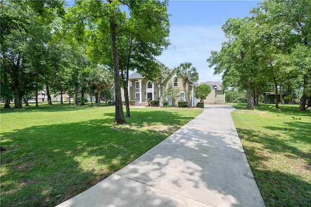 2924 Riverview Pointe Dr S, Theodore, AL 36582 - view of front of home with a front lawn and stucco siding