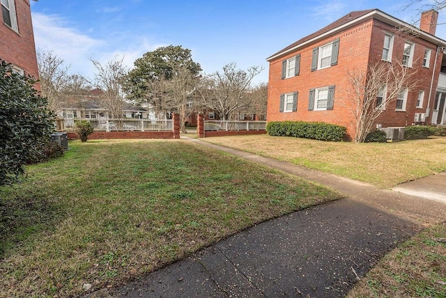 view of yard featuring central AC