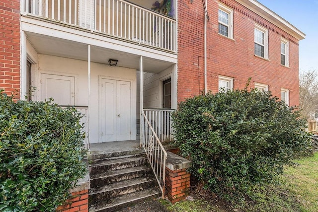 doorway to property with a balcony