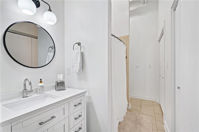 204 Conti St Unit 1A, Mobile, AL 36602 - bathroom featuring vanity, tile patterned floors, and curtained shower
