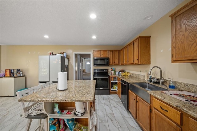 18141 Pennsylvania St, Robertsdale, AL 36567 - kitchen with freestanding refrigerator, open shelves, range with electric stovetop, dishwasher, and a sink