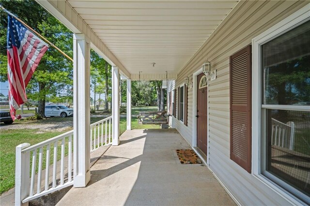 18141 Pennsylvania St, Robertsdale, AL 36567 - view of patio / terrace featuring covered porch