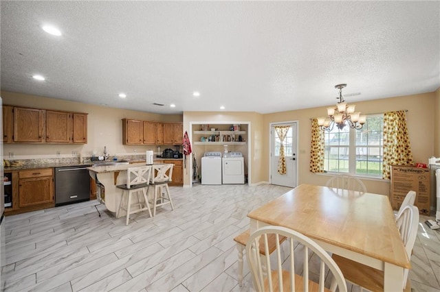 18141 Pennsylvania St, Robertsdale, AL 36567 - dining space with recessed lighting, a notable chandelier, washing machine and dryer, and a textured ceiling