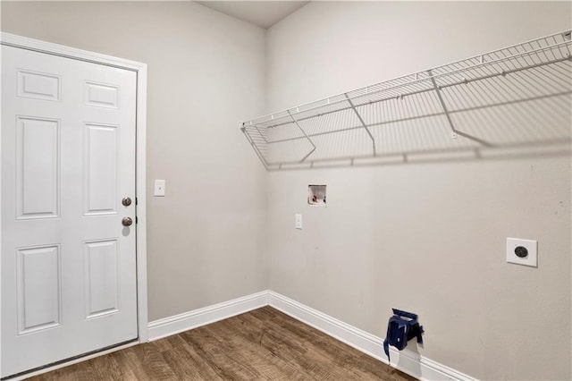 laundry room with hookup for an electric dryer, dark hardwood / wood-style floors, and washer hookup