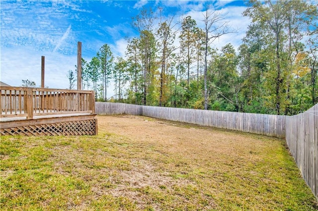 view of yard featuring a deck