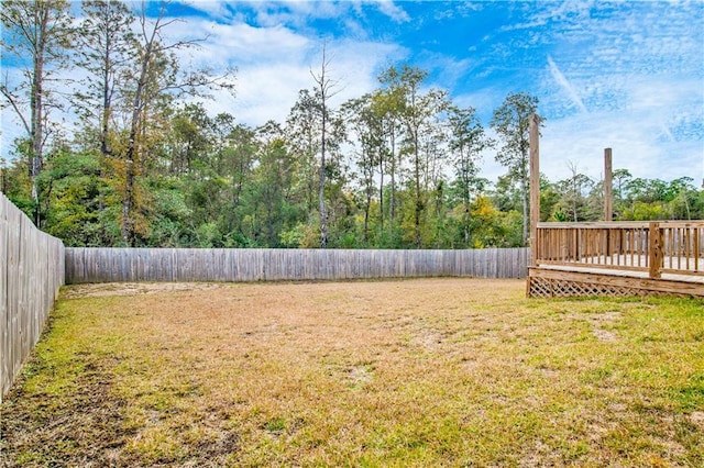 view of yard featuring a deck