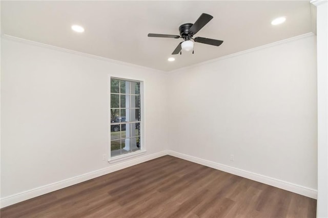 unfurnished room featuring crown molding, dark hardwood / wood-style flooring, and ceiling fan