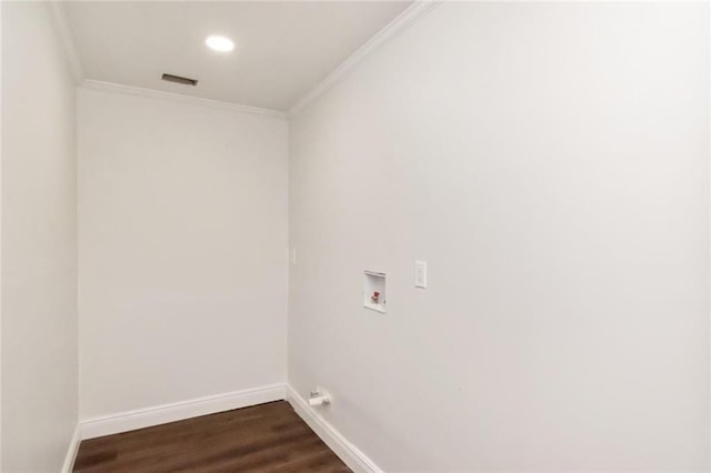 clothes washing area featuring hookup for a washing machine, dark wood-type flooring, and crown molding