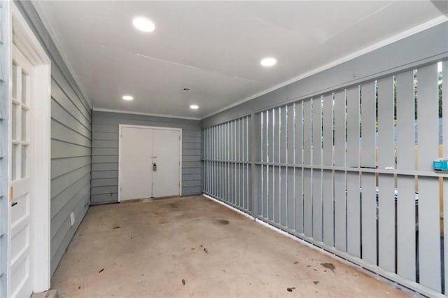 garage with wood walls