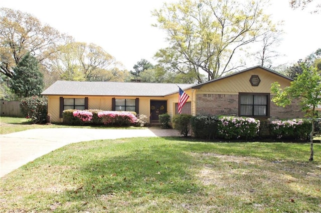 106 Windsor Ct, Daphne, AL 36526 - ranch-style home with concrete driveway, a front lawn, and brick siding