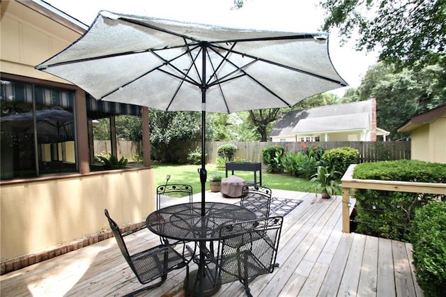 106 Windsor Ct, Daphne, AL 36526 - wooden terrace with a fenced backyard and outdoor dining space