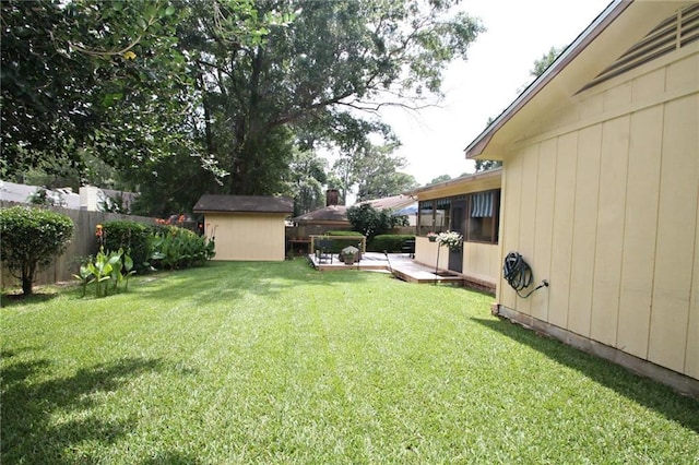 106 Windsor Ct, Daphne, AL 36526 - view of yard with a storage shed and a deck