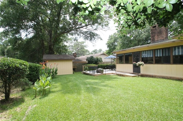 106 Windsor Ct, Daphne, AL 36526 - view of yard featuring a storage shed and a patio
