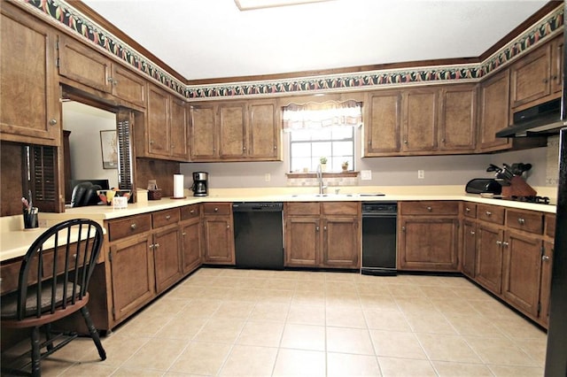 106 Windsor Ct, Daphne, AL 36526 - kitchen with black dishwasher, light countertops, light tile patterned floors, and under cabinet range hood