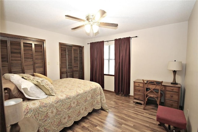 106 Windsor Ct, Daphne, AL 36526 - bedroom with multiple closets, wood finished floors, and a ceiling fan