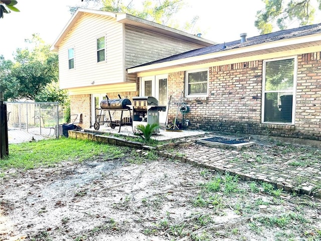 back of house featuring a patio area