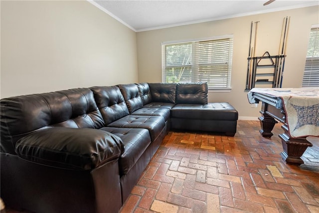 living room featuring crown molding