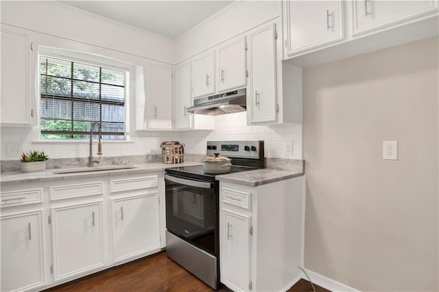 2604 Old Dobbin Dr E, Mobile, AL 36695 - kitchen featuring electric stove, under cabinet range hood, white cabinets, backsplash, and ornamental molding