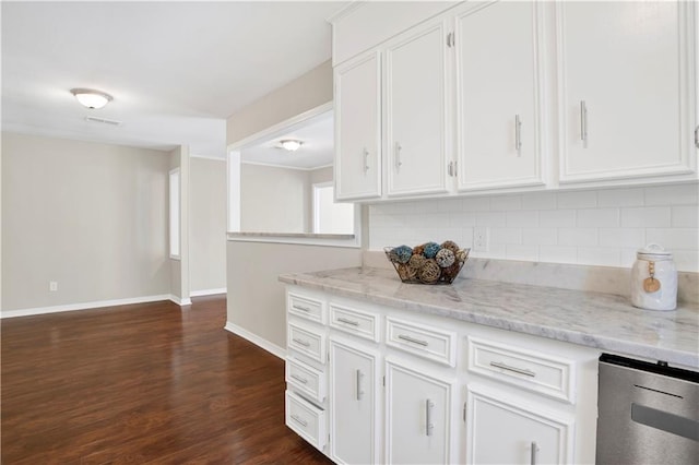 2604 Old Dobbin Dr E, Mobile, AL 36695 - kitchen with backsplash, dark wood finished floors, and white cabinetry