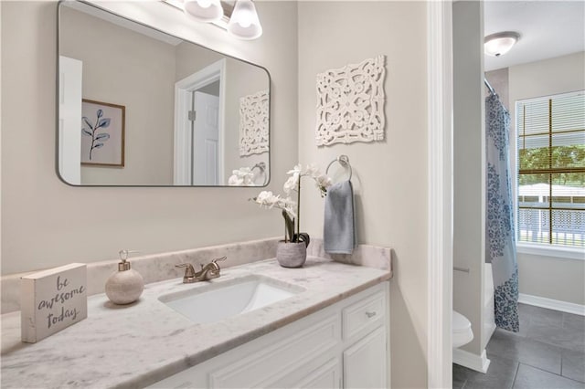 2604 Old Dobbin Dr E, Mobile, AL 36695 - full bathroom featuring vanity, tile patterned flooring, and a shower with shower curtain