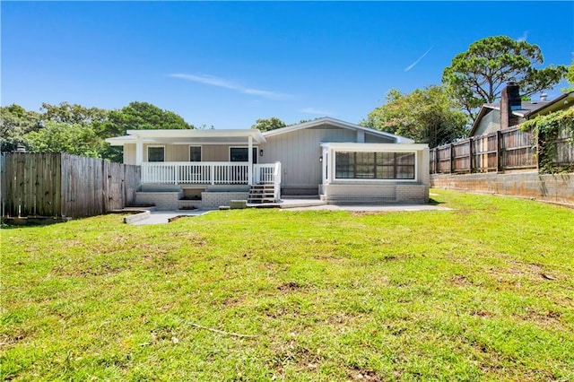 2604 Old Dobbin Dr E, Mobile, AL 36695 - rear view of house featuring a fenced backyard and a patio area