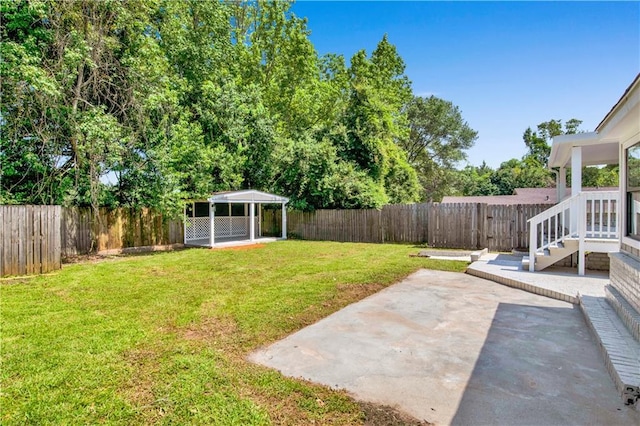 2604 Old Dobbin Dr E, Mobile, AL 36695 - fenced backyard with a patio