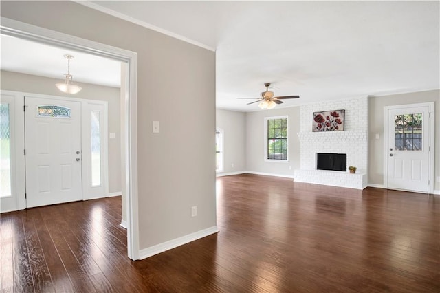 2604 Old Dobbin Dr E, Mobile, AL 36695 - entryway with wood finished floors, ceiling fan, and a fireplace