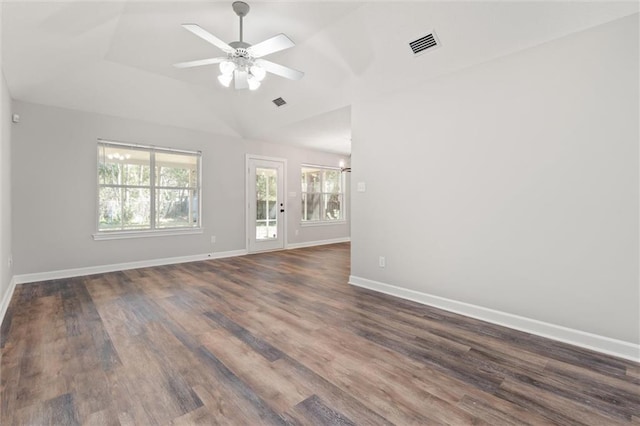 unfurnished living room with dark wood finished floors, baseboards, visible vents, and a ceiling fan