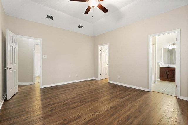 285 Portside Blvd, Mobile, AL 36695 - unfurnished bedroom with dark wood-style floors, baseboards, and ensuite bath