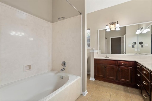 285 Portside Blvd, Mobile, AL 36695 - bathroom featuring tile patterned floors, a tub, and vanity