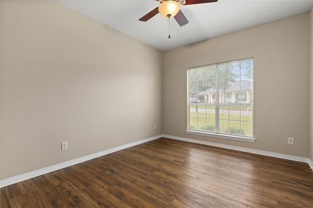 285 Portside Blvd, Mobile, AL 36695 - spare room with ceiling fan, baseboards, and dark wood-style flooring