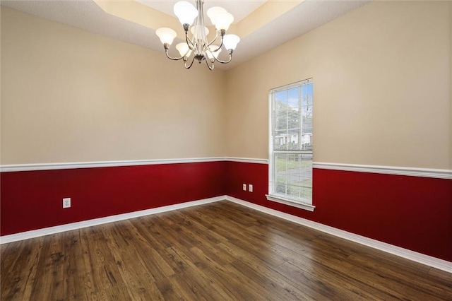 285 Portside Blvd, Mobile, AL 36695 - unfurnished room featuring baseboards, a chandelier, and wood finished floors