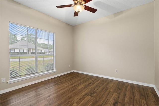285 Portside Blvd, Mobile, AL 36695 - unfurnished room with baseboards, dark wood-type flooring, and a ceiling fan