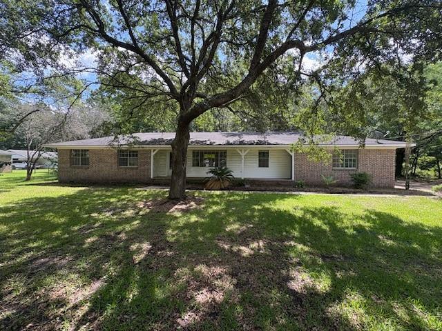 3515 York Rd, Mobile, AL 36605 - ranch-style home with brick siding and a front yard