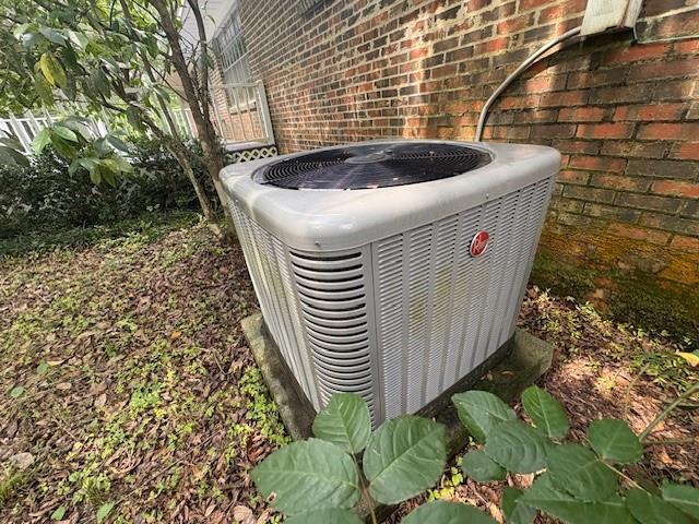 3515 York Rd, Mobile, AL 36605 - exterior view of central AC unit and brick siding