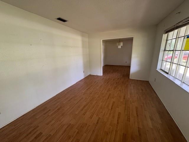3515 York Rd, Mobile, AL 36605 - spare room with wood finished floors