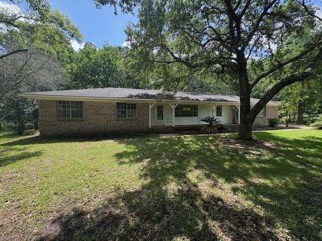 3515 York Rd, Mobile, AL 36605 - view of front of property with brick siding and a front yard