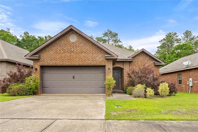 6120 Whitebark Dr, Mobile, AL 36693 - view of front of house featuring brick siding, driveway, an attached garage, and a front yard