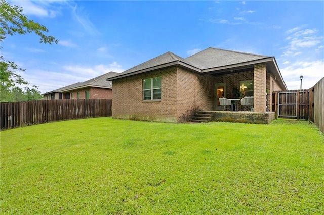 6120 Whitebark Dr, Mobile, AL 36693 - rear view of property with brick siding and a shingled roof