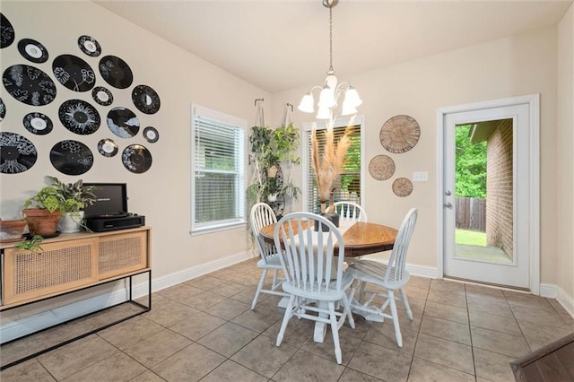 6120 Whitebark Dr, Mobile, AL 36693 - dining room with a chandelier, plenty of natural light, and tile patterned flooring