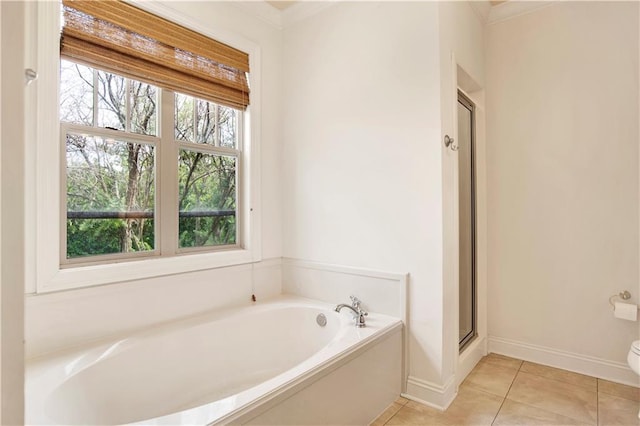 24795 Austin Rd, Daphne, AL 36526 - full bath featuring healthy amount of natural light, a bath, tile patterned floors, and a stall shower