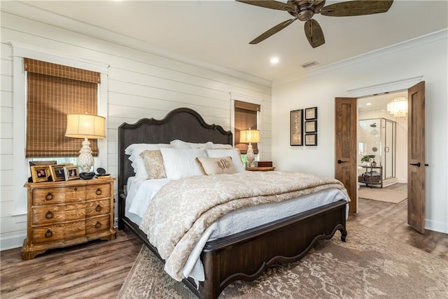 bedroom with a ceiling fan, wood finished floors, visible vents, recessed lighting, and crown molding