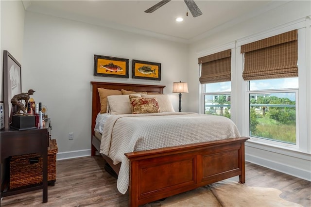 bedroom featuring recessed lighting, ceiling fan, baseboards, and wood finished floors