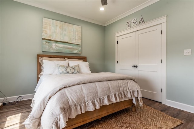 bedroom featuring recessed lighting, wood finished floors, baseboards, and ornamental molding